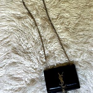 Saint Laurent gold chain tassle bag